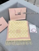 yellow and pink polka dot scarf